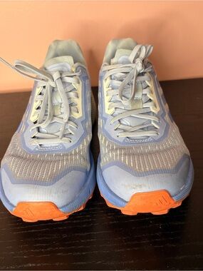 Adidas Women’s Light Blue Athletic Sneakers with Orange Accents